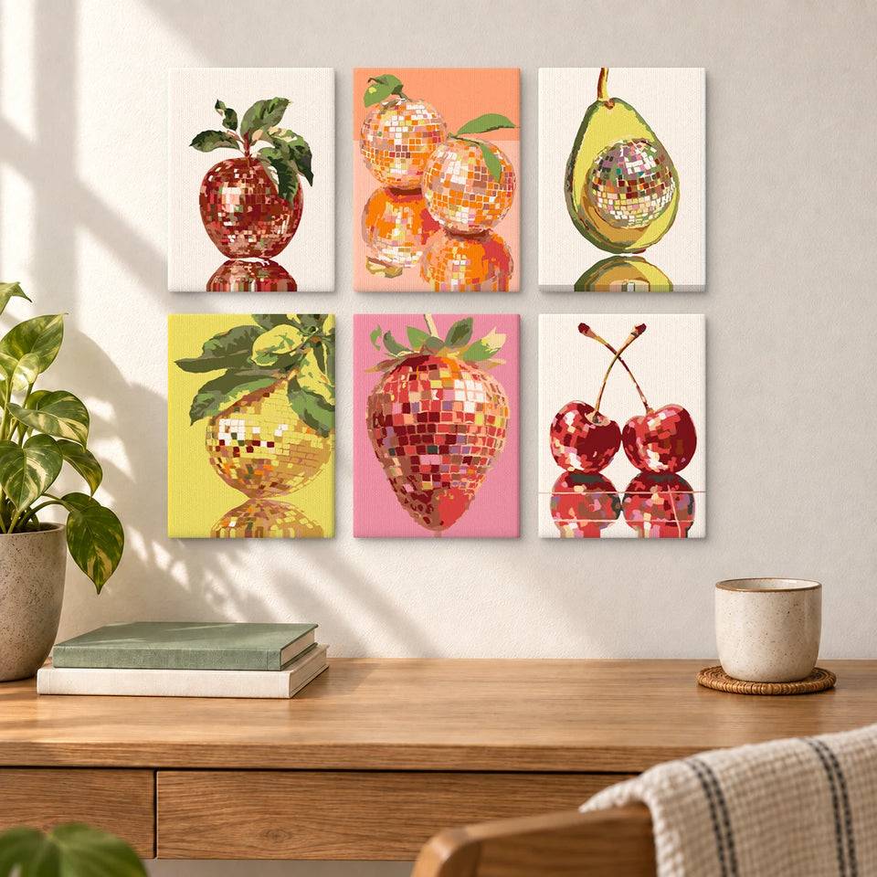 Disco Fruits — completed artworks displayed in a room; frames shown for styling.