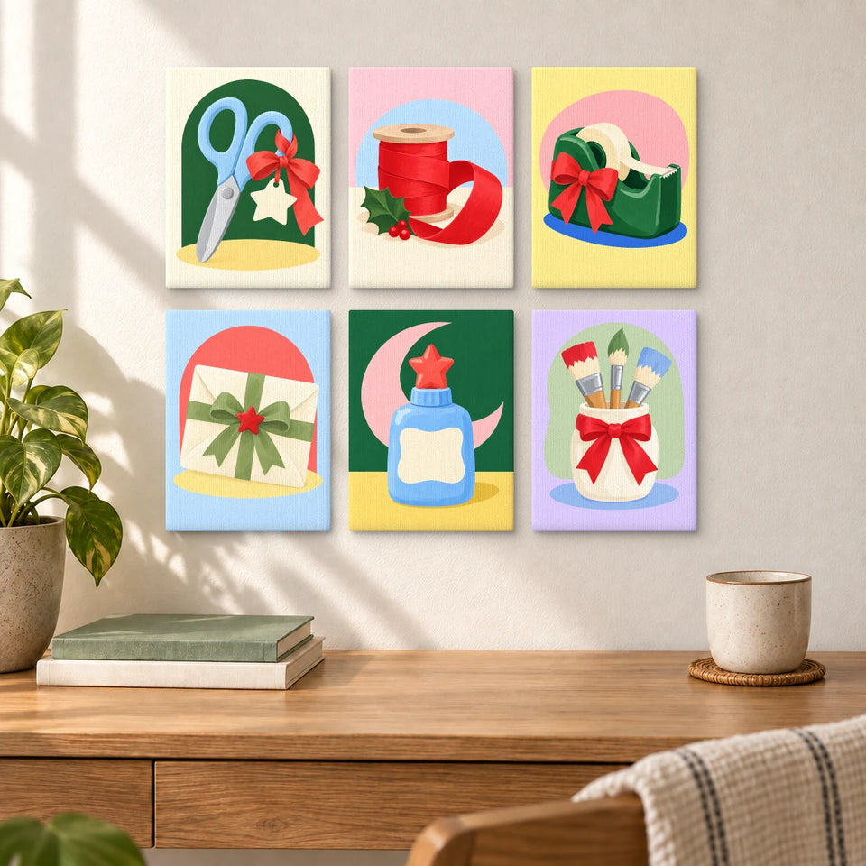 Festive Craft Table — six completed mini paintings displayed above a desk.