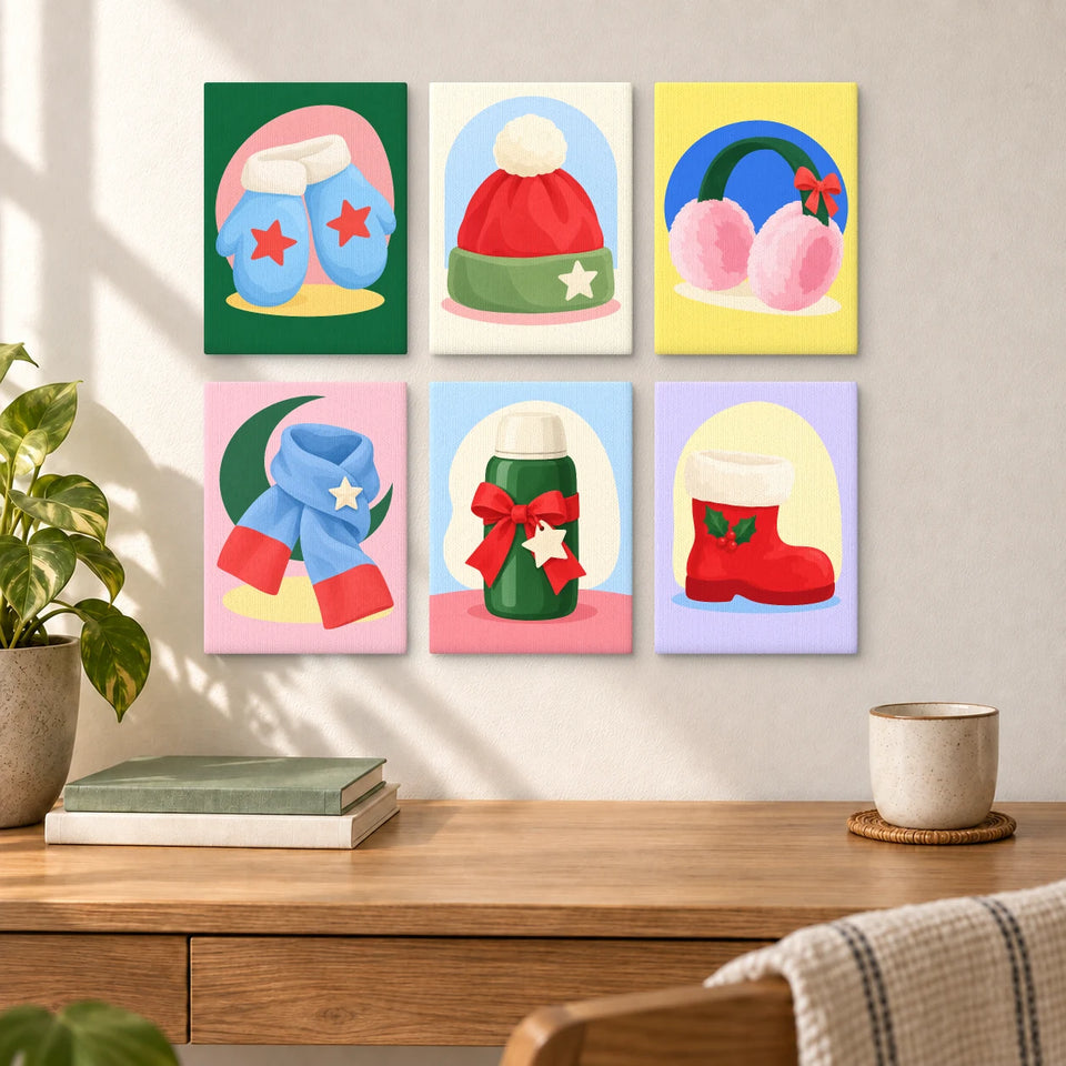 Snow Day Christmas — six completed mini paintings displayed above a desk.