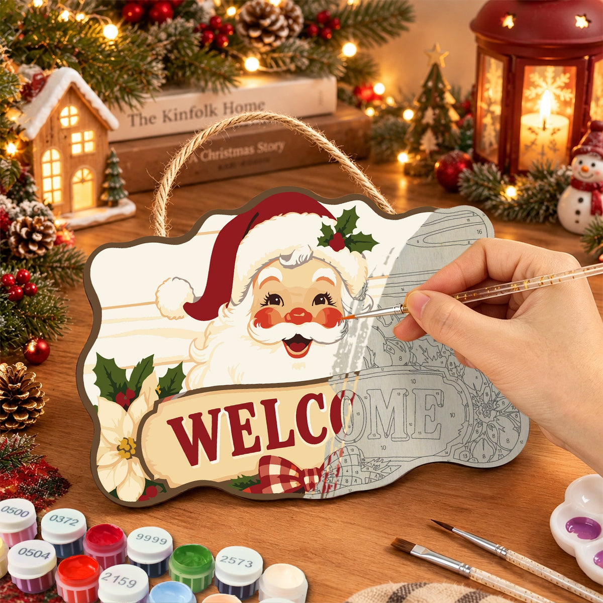 Painting the wooden sign at a festive table