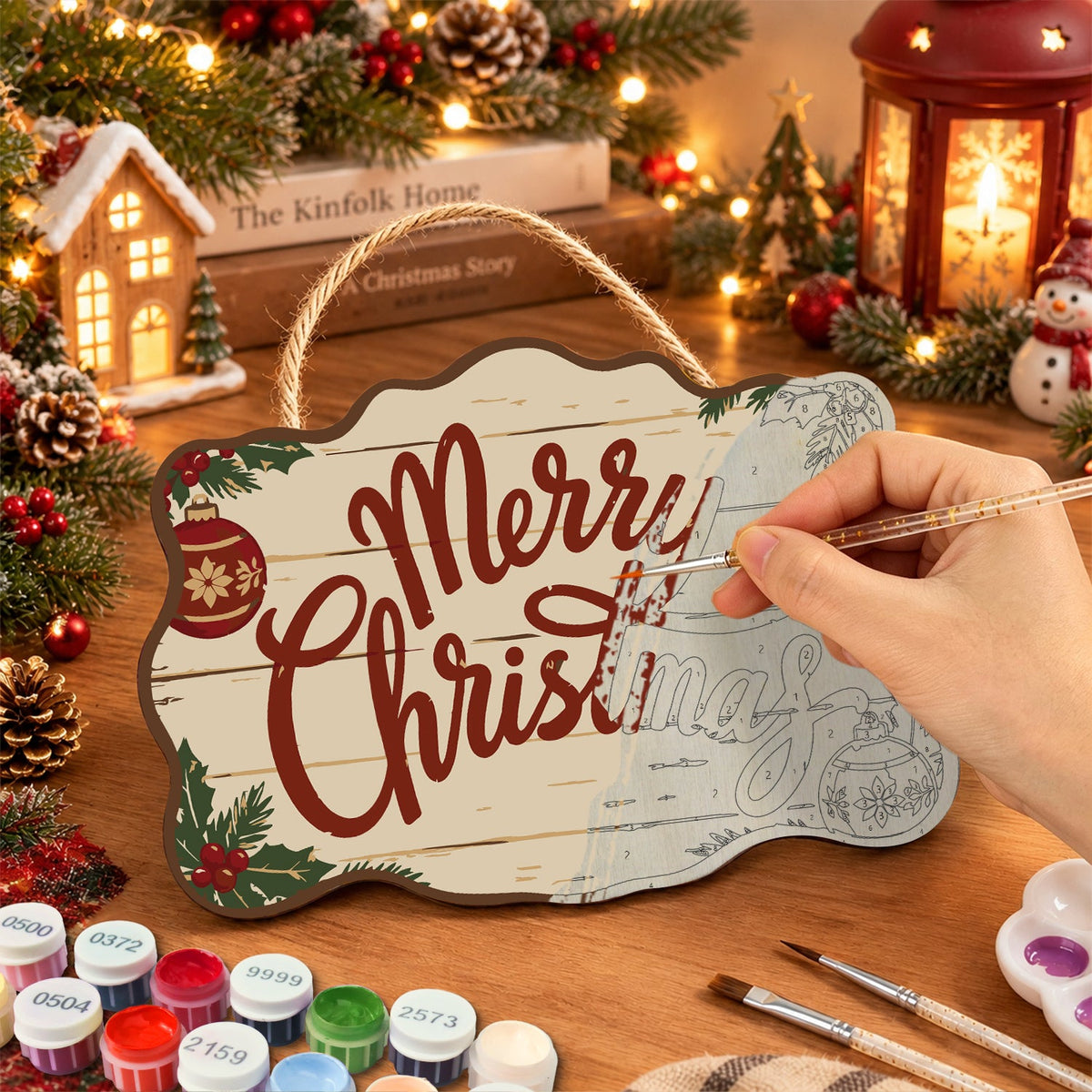 Painting the wooden sign at a festive table