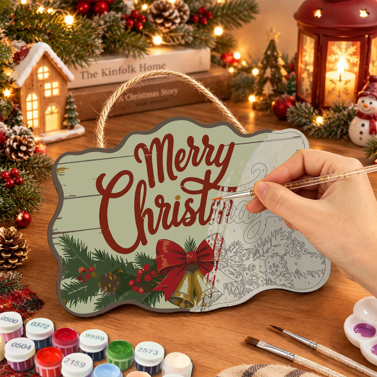 Painting the wooden sign at a festive table