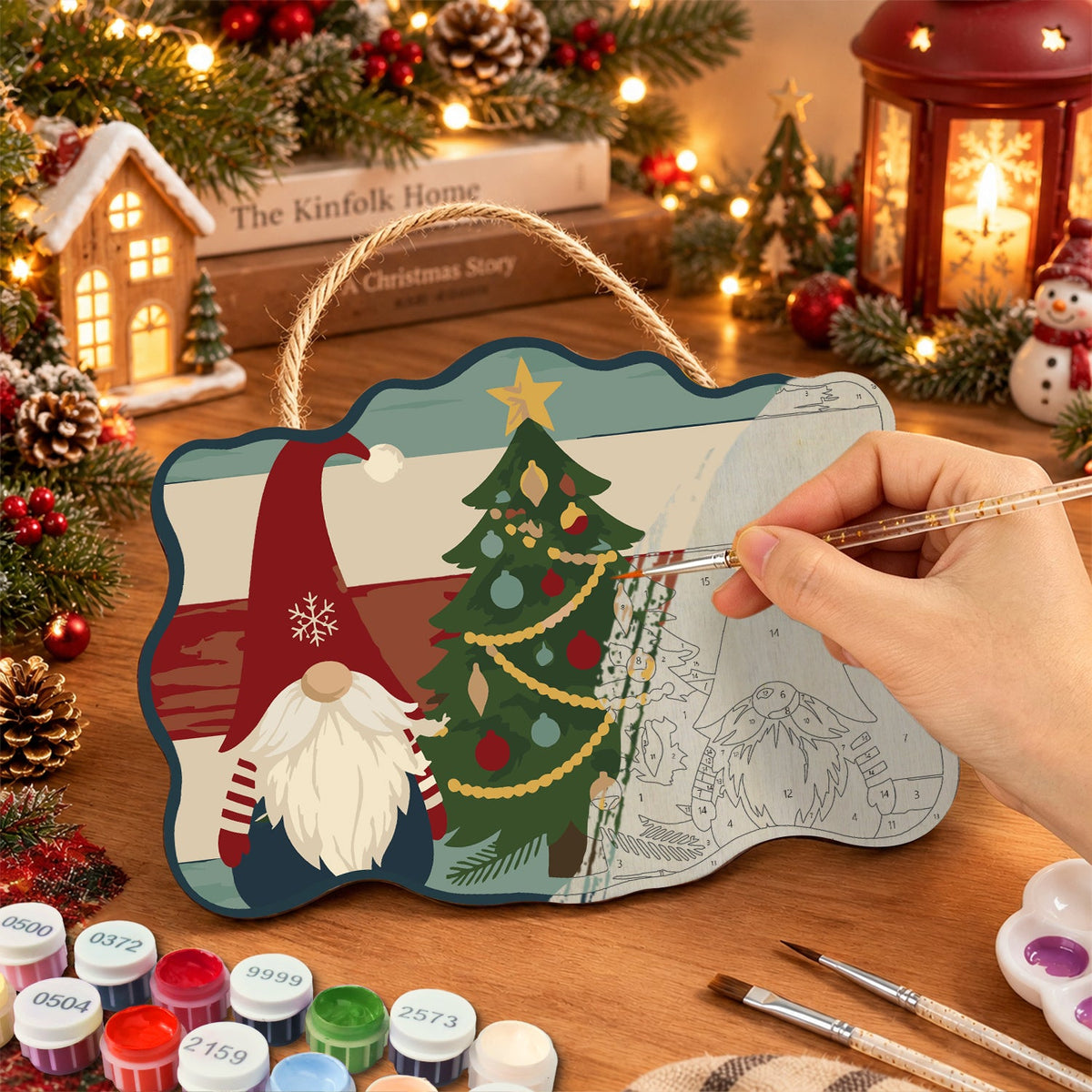 Painting the wooden sign at a festive table