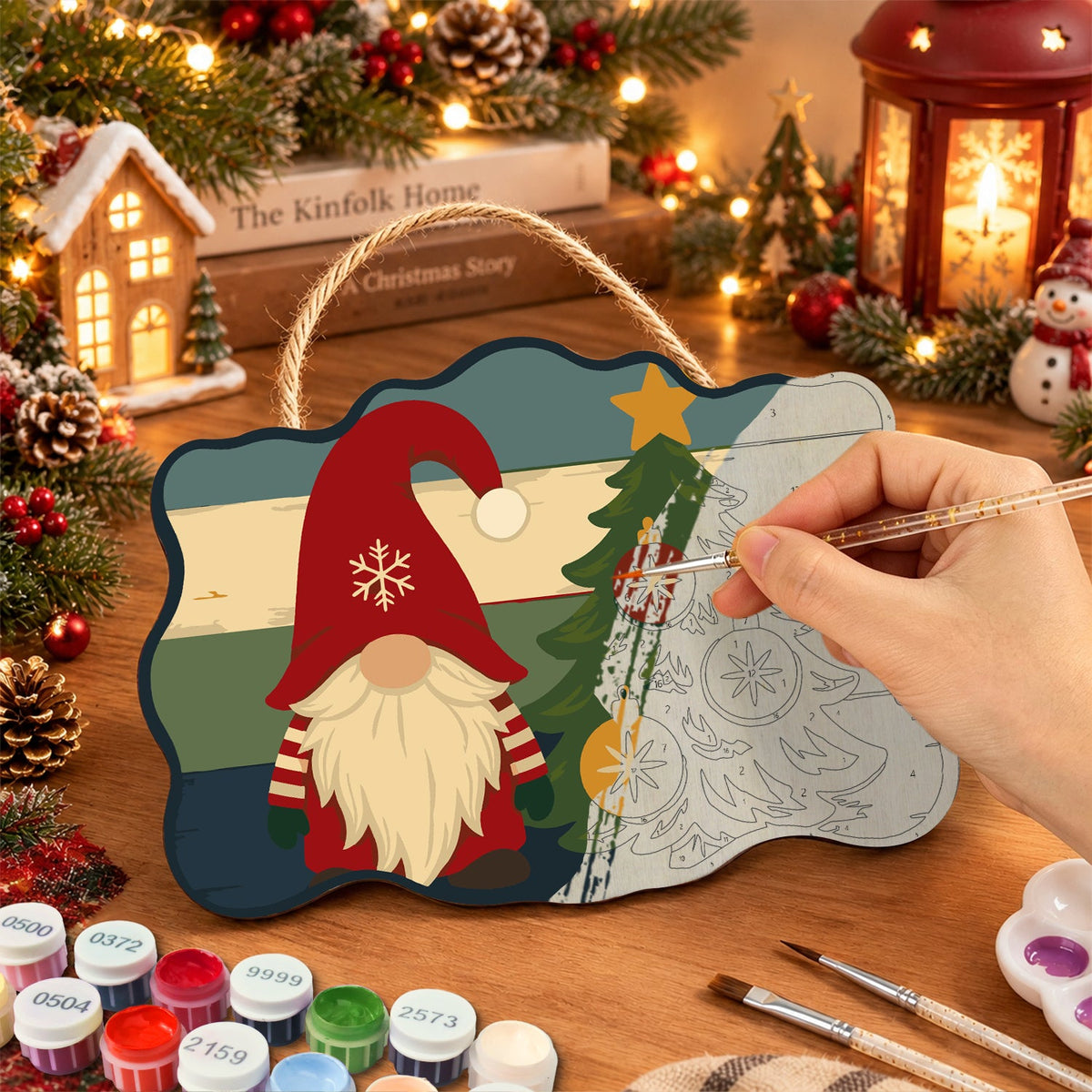 Painting the wooden sign at a festive table