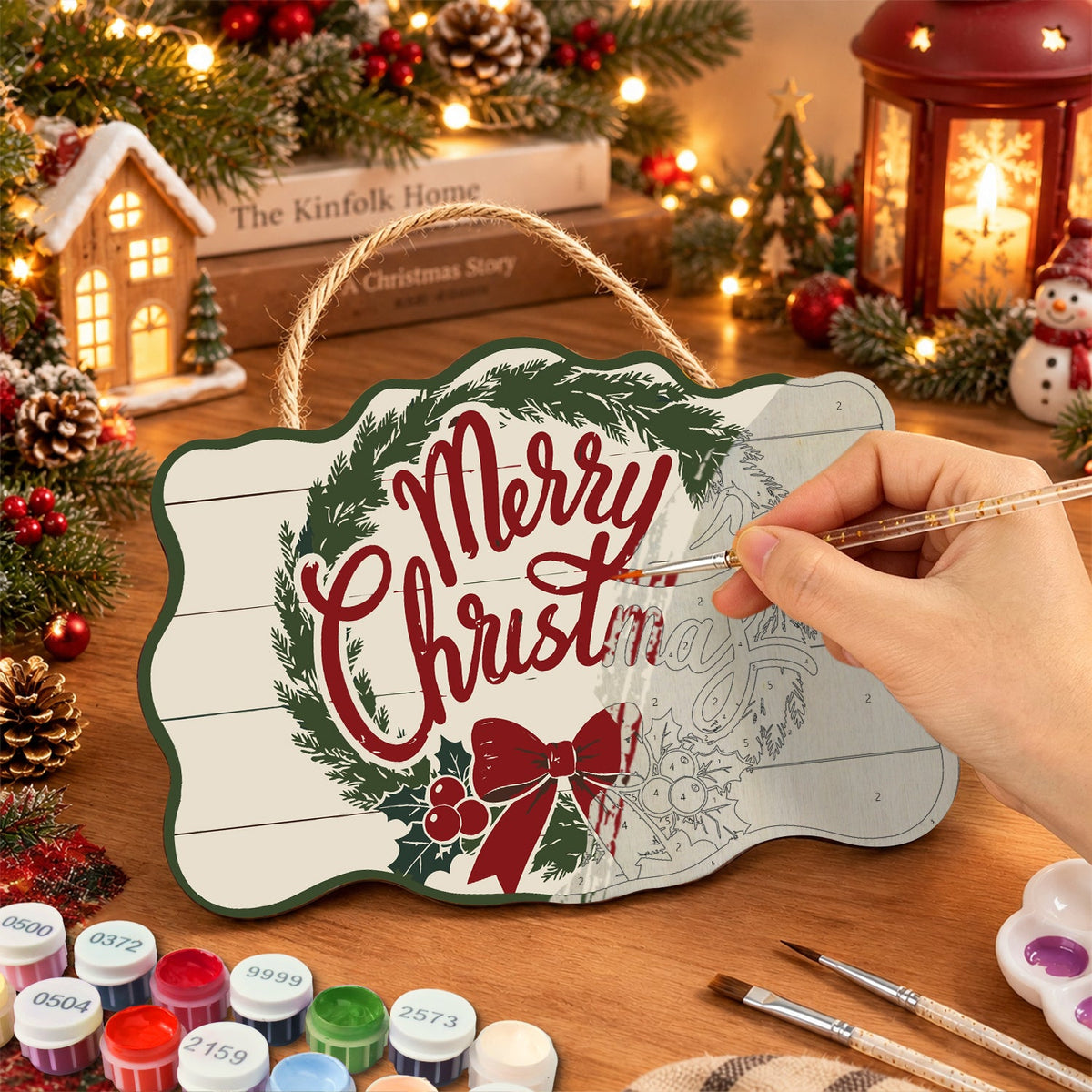 Painting the wooden sign at a festive table