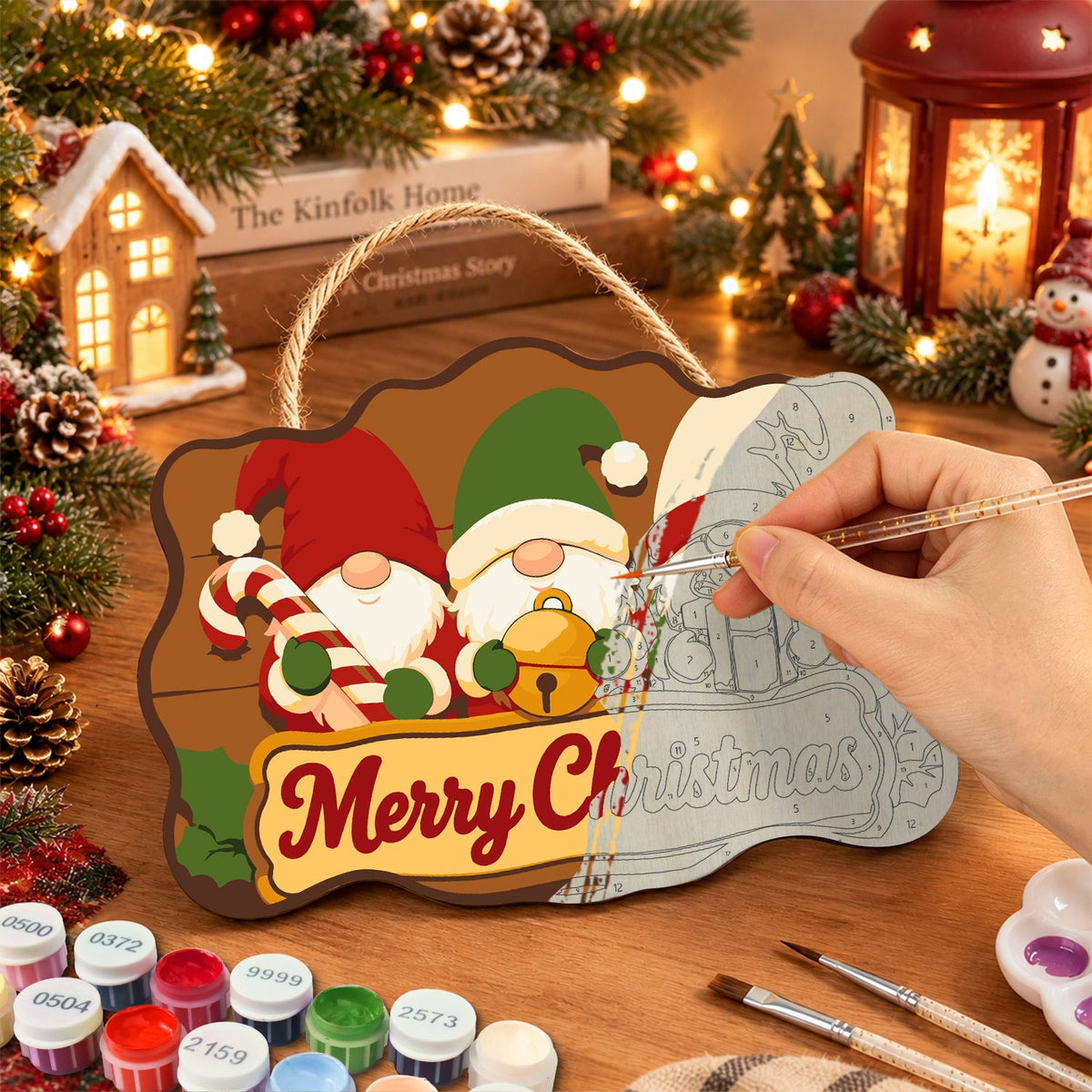 Painting the wooden sign at a festive table