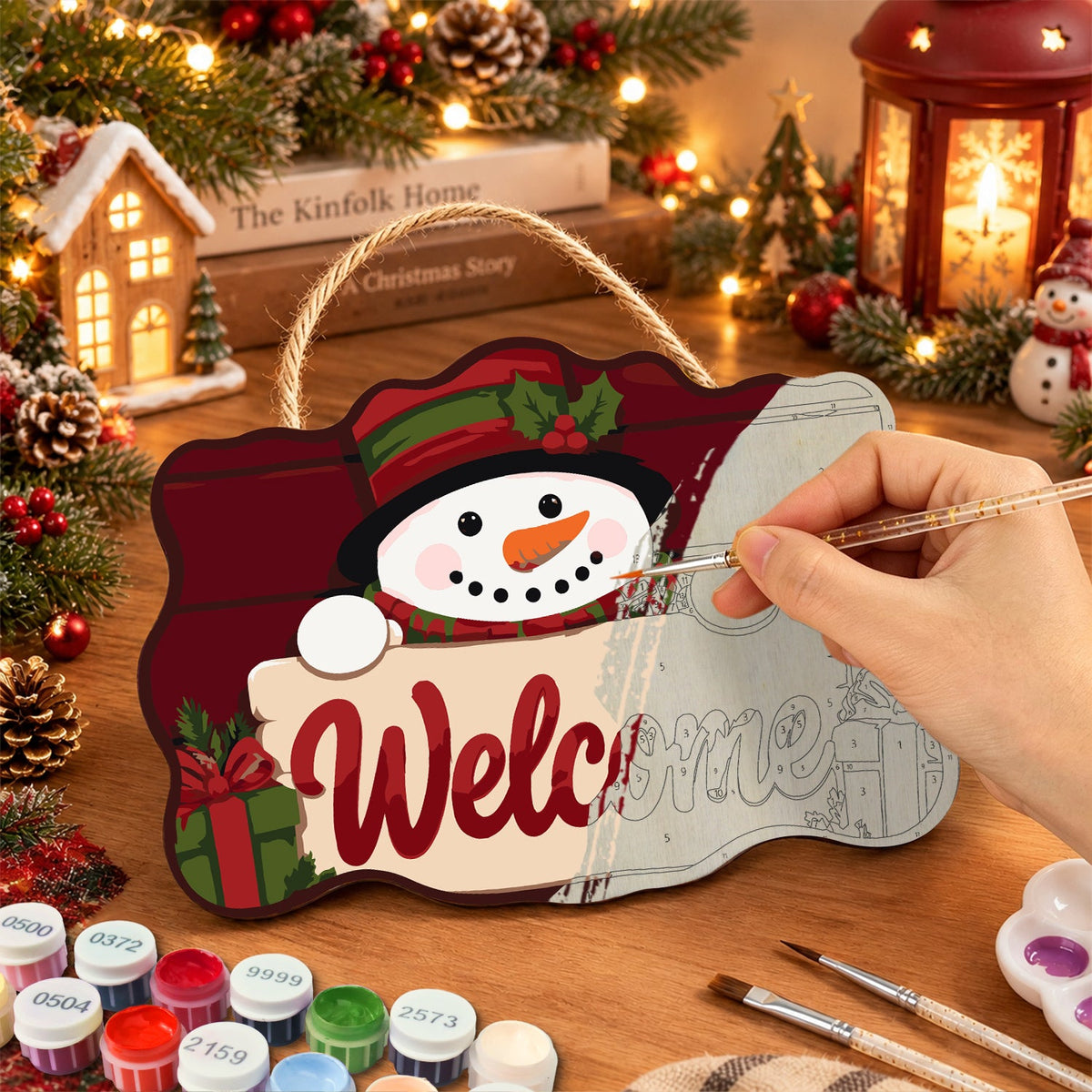 Painting the wooden sign at a festive table