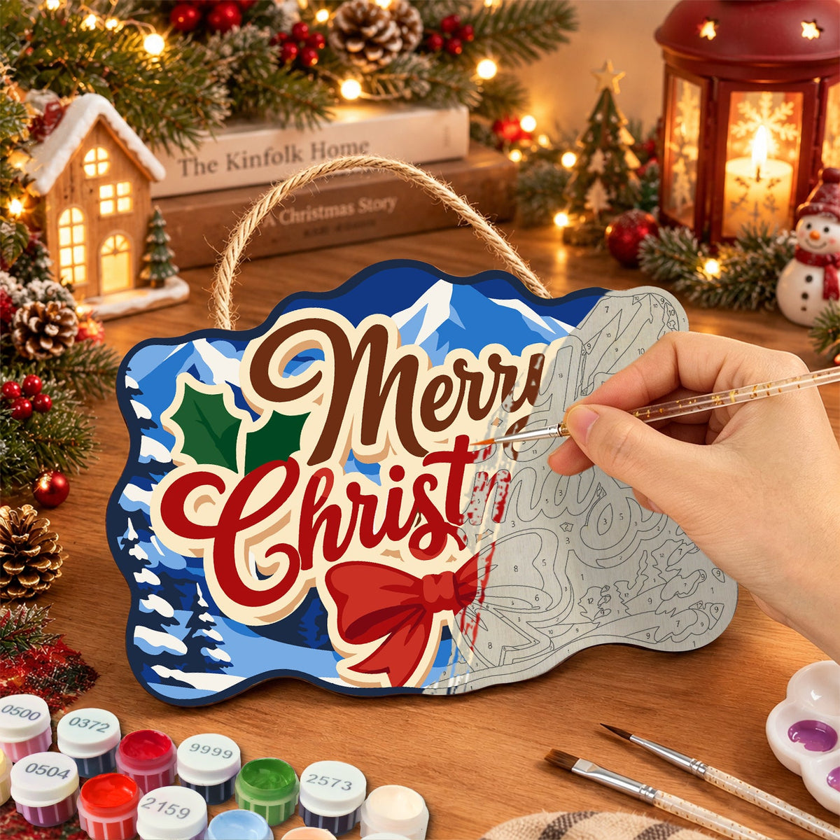 Painting the wooden sign at a festive table