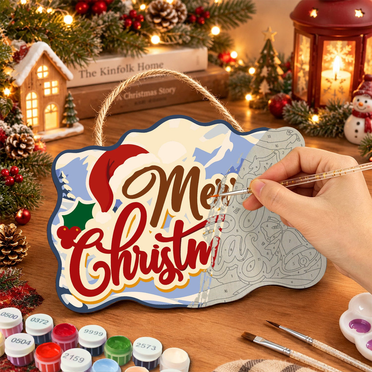 Painting the wooden sign at a festive table