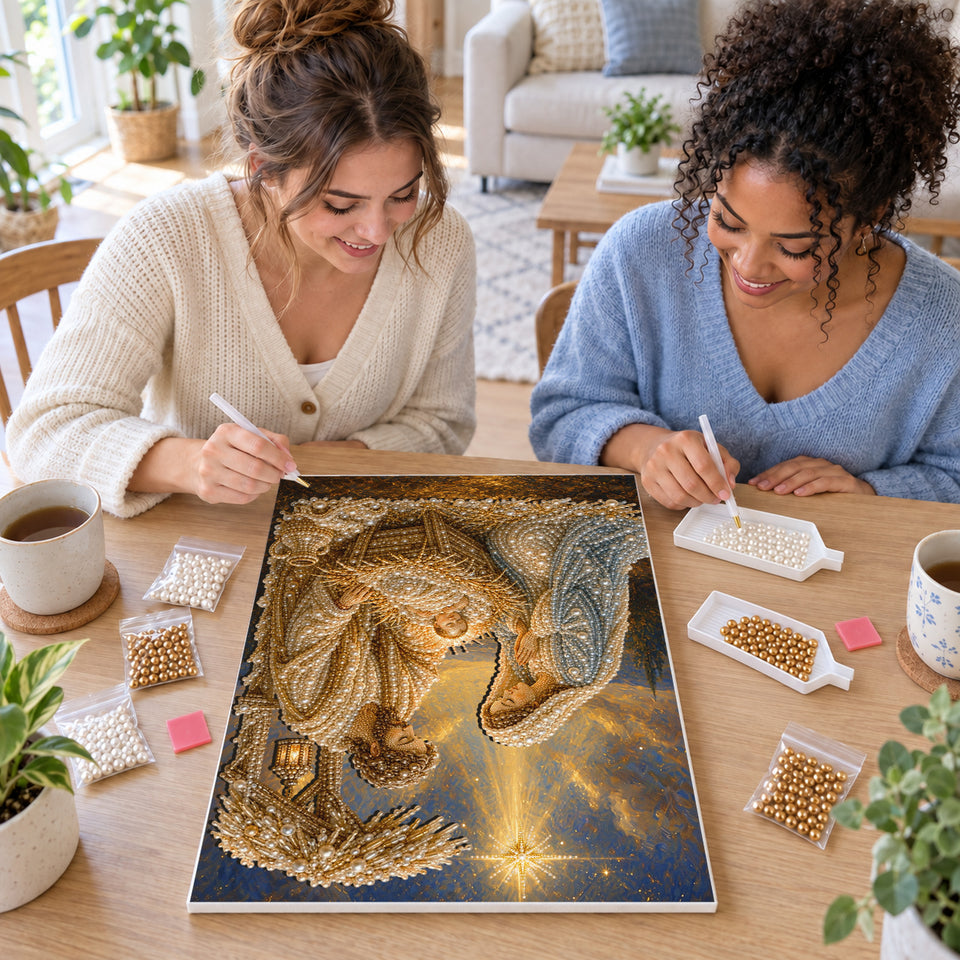 Two friends creating one shared Pearl artwork — Golden Nativity Under the Star. Pearl diamond painting DIY kit by Isuvio.