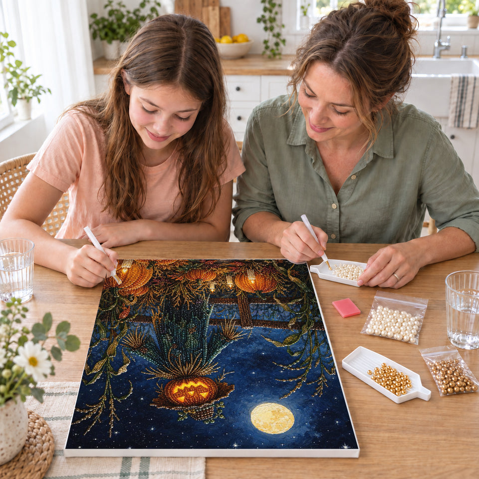 Mother and daughter creating one shared Pearl artwork — Pumpkin Scarecrow Beneath a Full Moon. Pearl diamond painting DIY kit by Isuvio.