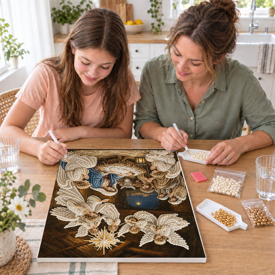 Mother and daughter creating one shared Pearl artwork — Nativity Scene with Angels and a Guiding Star. Pearl diamond painting DIY kit by Isuvio.