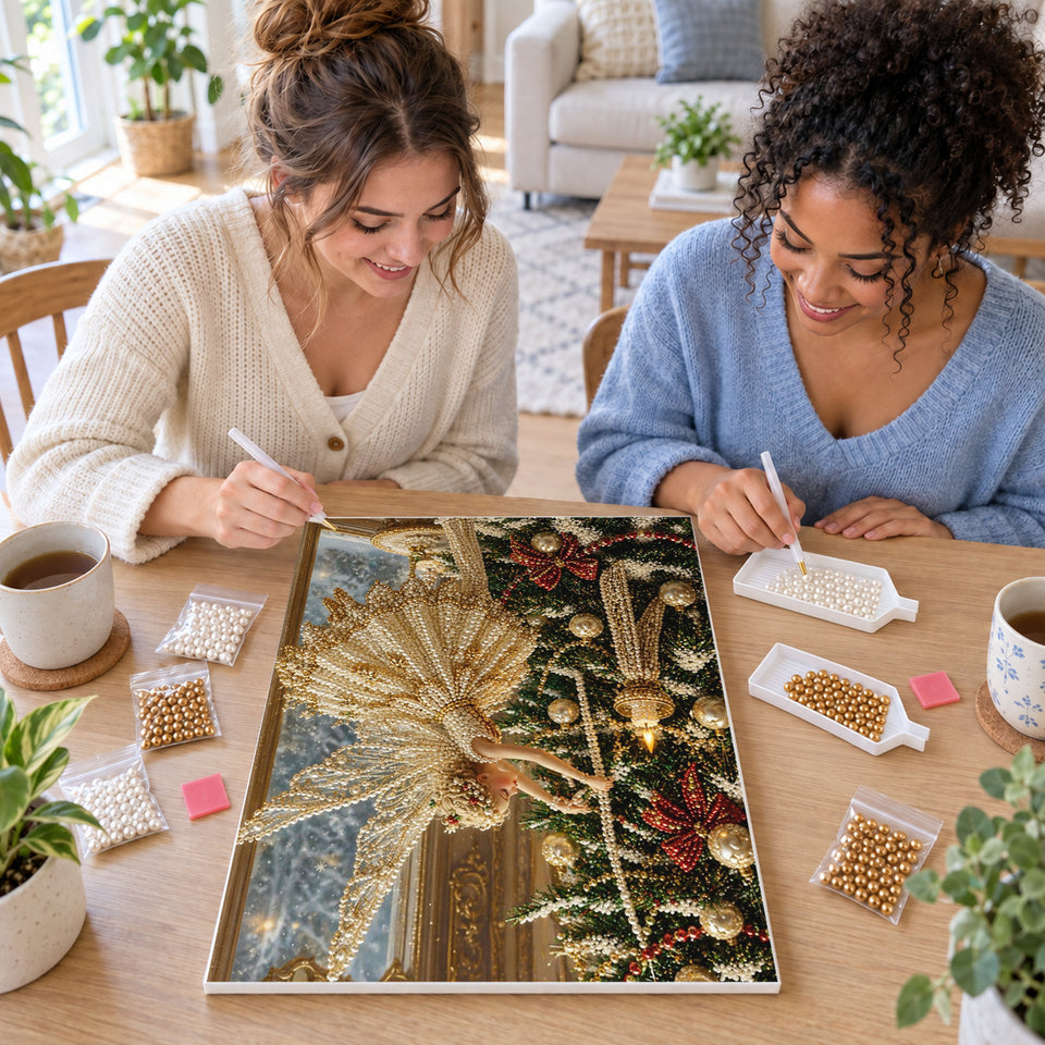 Two friends creating one shared Pearl artwork — Golden Fairy Decorating a Christmas Tree. Pearl diamond painting DIY kit by Isuvio.