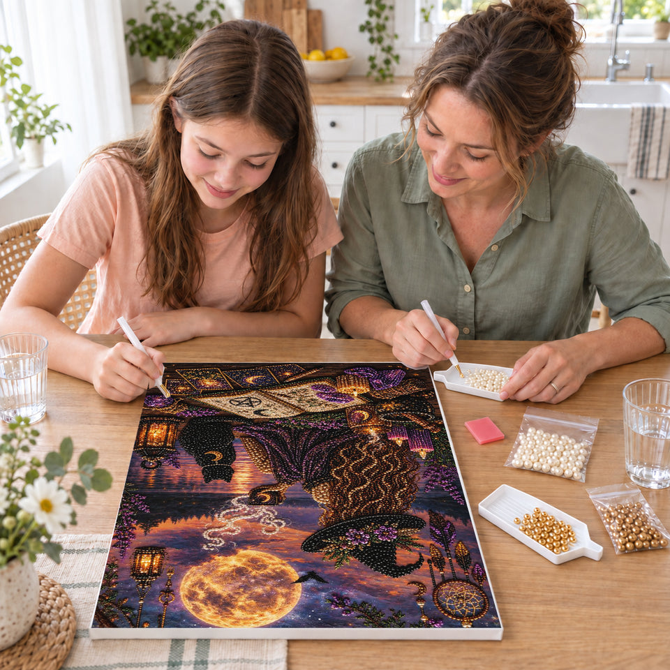 Mother and daughter creating one shared Pearl artwork — Moonlit Witch with a Black Cat by the Lake. Pearl diamond painting DIY kit by Isuvio.