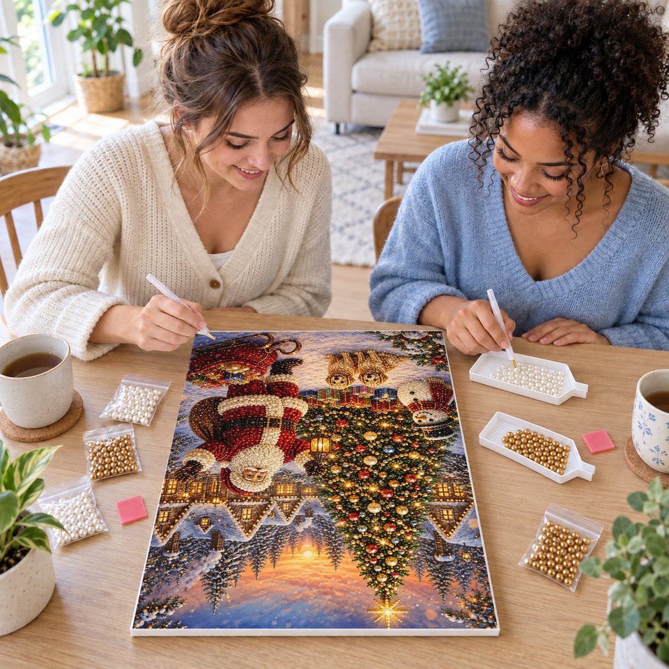 Two friends creating one shared Pearl artwork — Santa and Puppies Beside a Village Christmas Tree. Pearl diamond painting DIY kit by Isuvio.