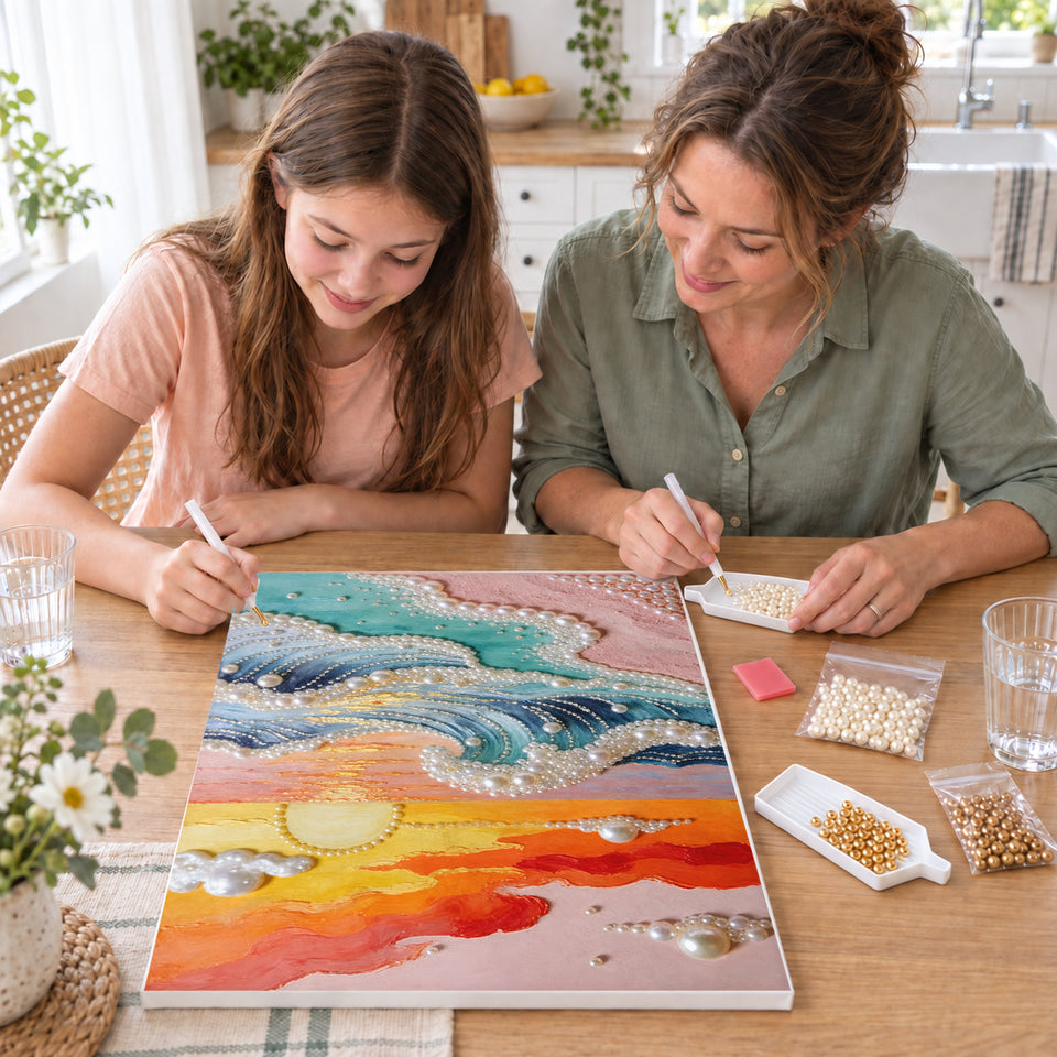 Mother and daughter creating one shared Pearl artwork — Pastel Sunset Over Pearl Ocean Waves. Pearl diamond painting DIY kit by Isuvio.