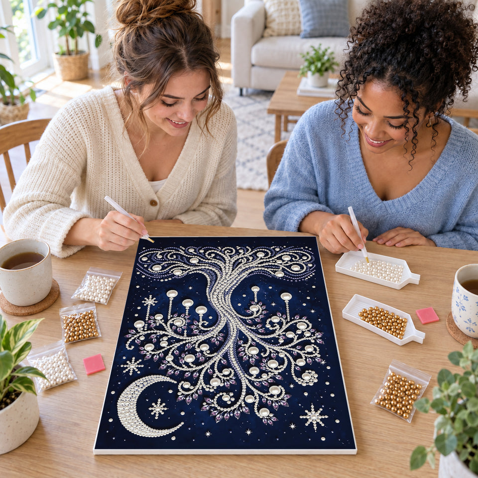 Two friends creating one shared Pearl artwork — Pearl Tree Beneath a Crescent Moon and Stars. Pearl diamond painting DIY kit by Isuvio.