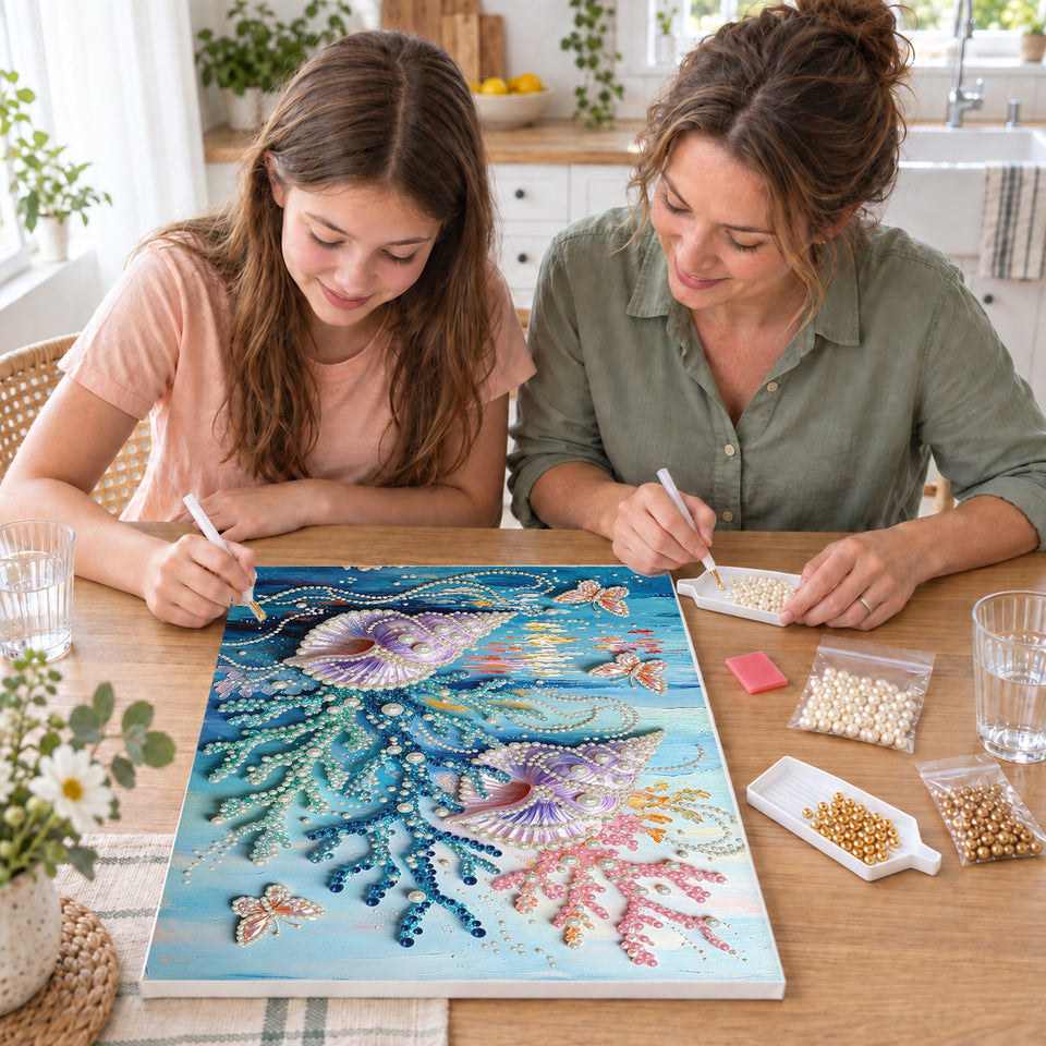 Mother and daughter creating one shared Pearl artwork — Purple Seashells Among Colorful Coral. Pearl diamond painting DIY kit by Isuvio.