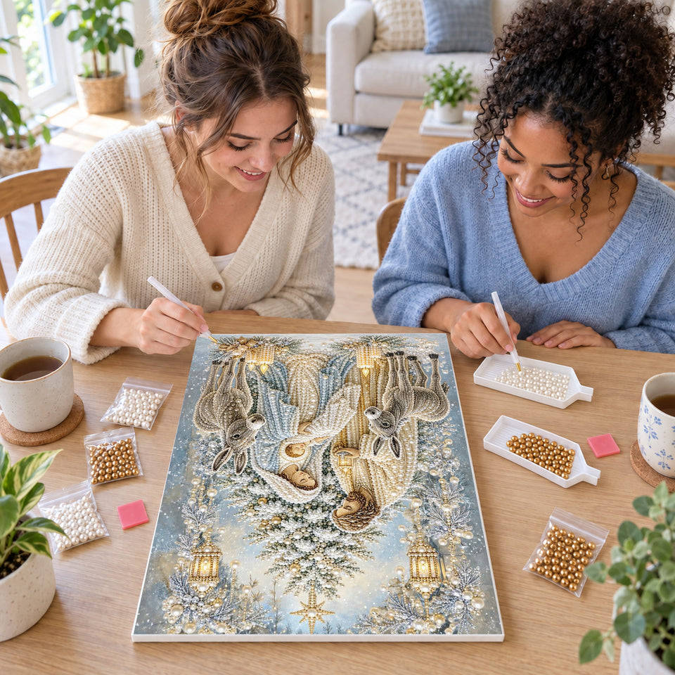 Two friends creating one shared Pearl artwork — Blue Winter Nativity with Donkeys. Pearl diamond painting DIY kit by Isuvio.