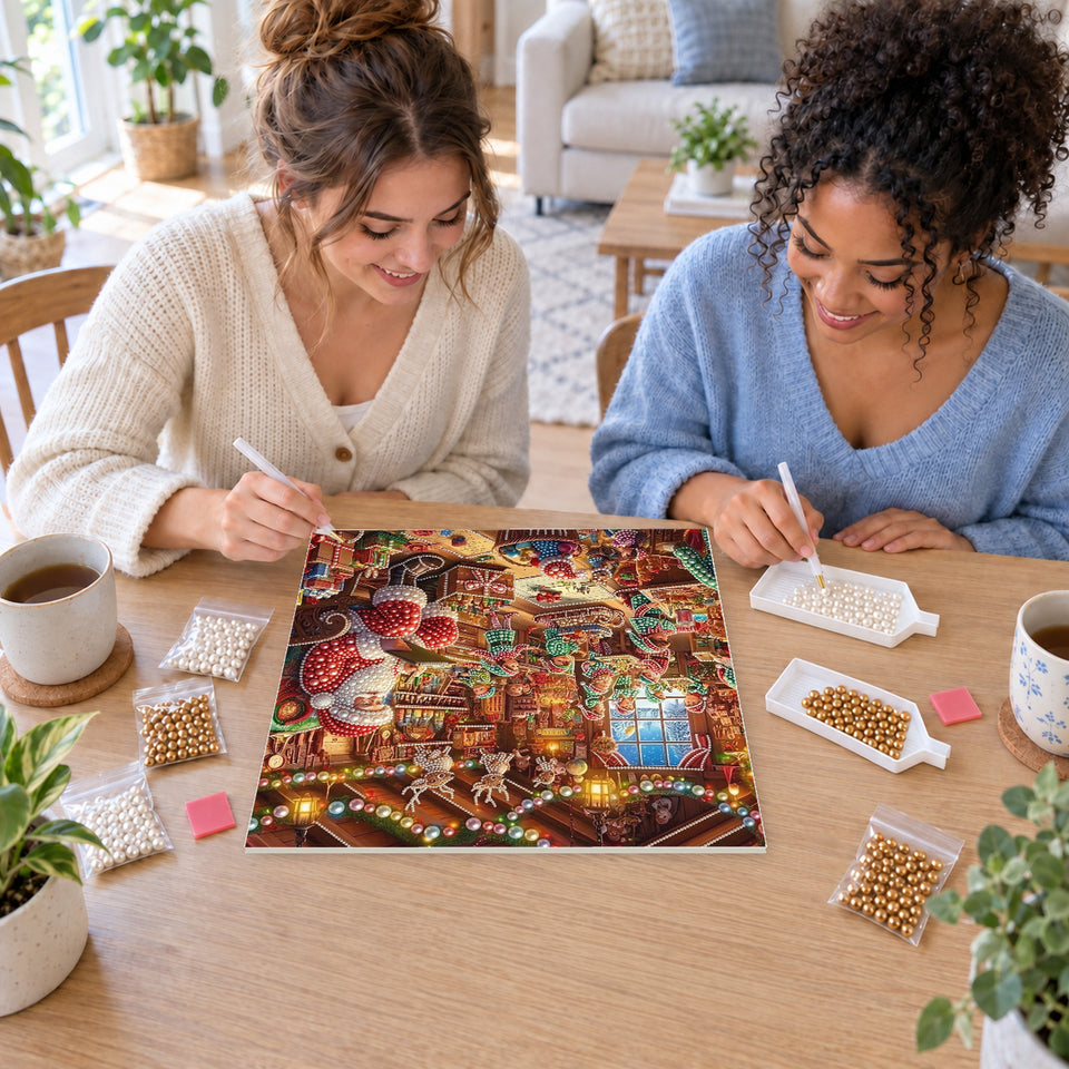 Two friends creating one shared Pearl artwork — Santa Checking His List in the Toy Workshop. Pearl diamond painting DIY kit by Isuvio.