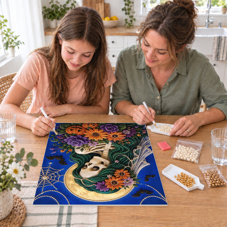 Mother and daughter creating one shared Pearl artwork — Skeleton Bride with a Purple and Orange Bouquet. Pearl diamond painting DIY kit by Isuvio.