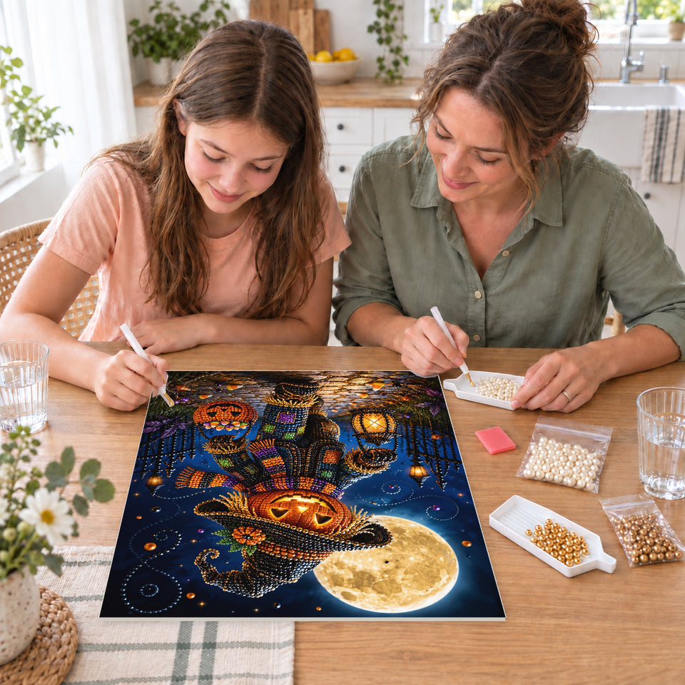 Mother and daughter creating one shared Pearl artwork — Pumpkin Scarecrow with a Moonlit Lantern. Pearl diamond painting DIY kit by Isuvio.