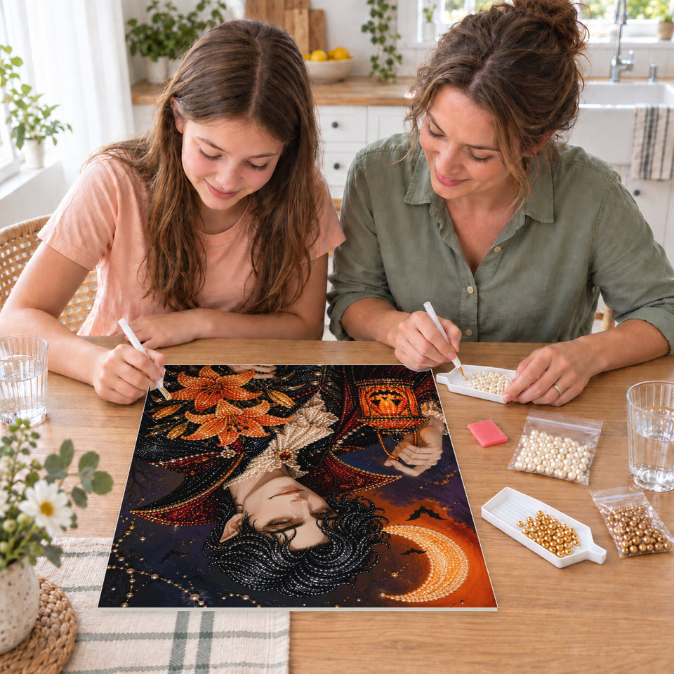 Mother and daughter creating one shared Pearl artwork — Moonlit Vampire with Orange Lilies. Pearl diamond painting DIY kit by Isuvio.