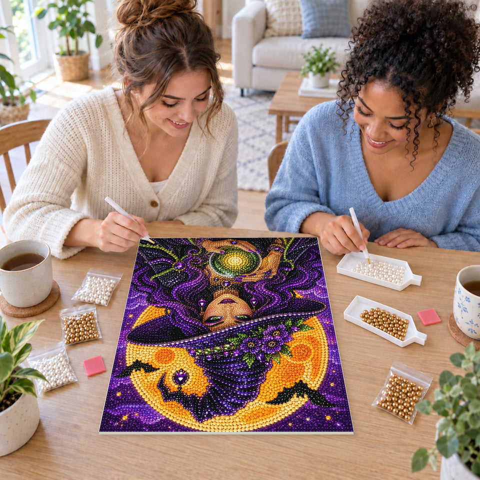 Two friends creating one shared Pearl artwork — Purple-Haired Witch Holding a Glowing Green Orb. Pearl diamond painting DIY kit by Isuvio.