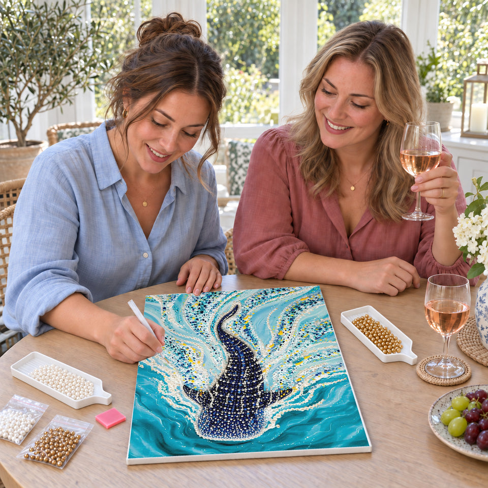 Friends enjoying a sip and craft session — Whale Shark Swimming Through Turquoise Water. Pearl diamond painting DIY kit by Isuvio.