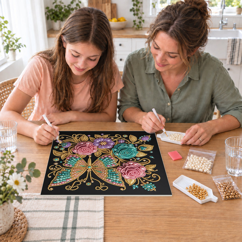 Mother and daughter creating one shared Pearl artwork — Jewel Butterfly with Pink and Teal Roses. Pearl diamond painting DIY kit by Isuvio.