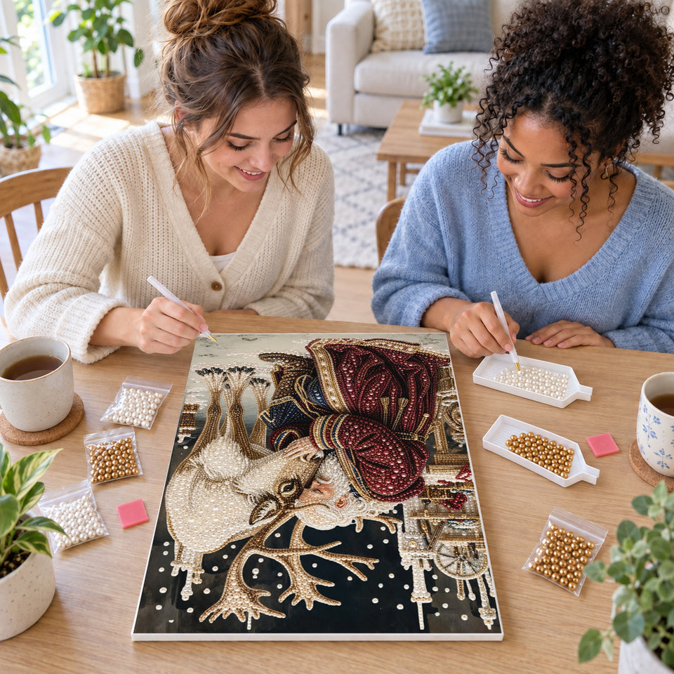 Two friends crafting together — Santa Embracing the White Reindeer, Pearl diamond painting DIY kit.