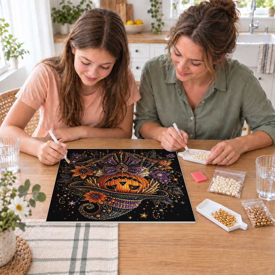Mother and daughter creating one shared Pearl artwork — Pumpkin Witch in an Ornate Hat and Floral Collar. Pearl diamond painting DIY kit by Isuvio.