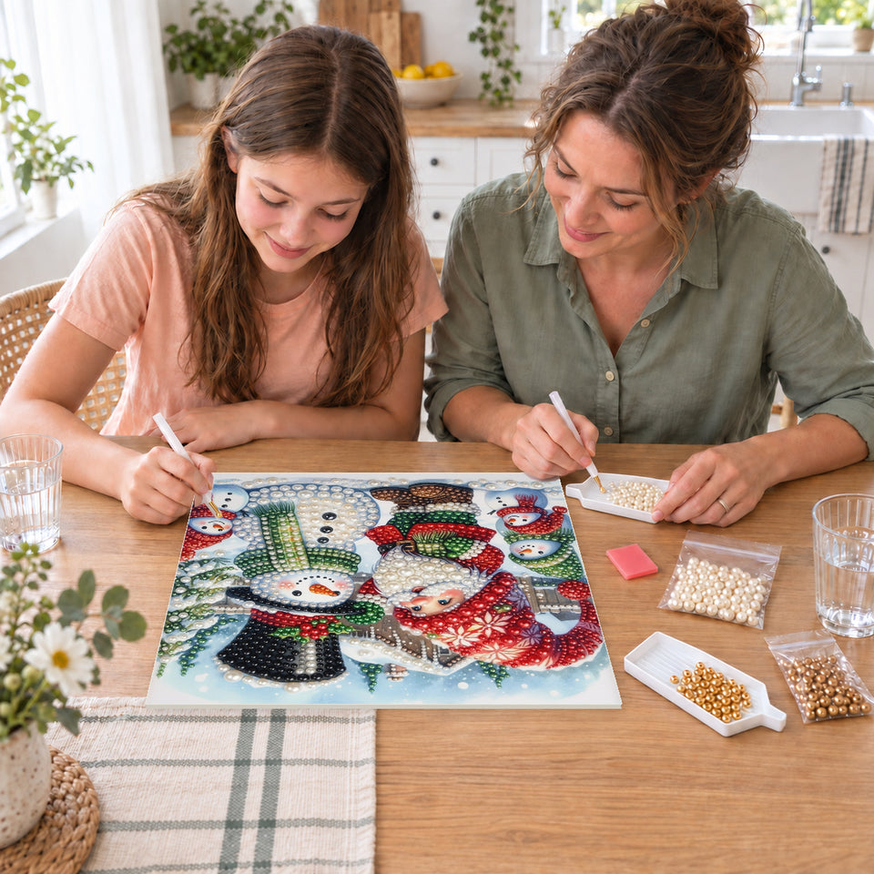 Mother and daughter creating one shared Pearl artwork — Christmas Gnome and Snowman Friends. Pearl diamond painting DIY kit by Isuvio.
