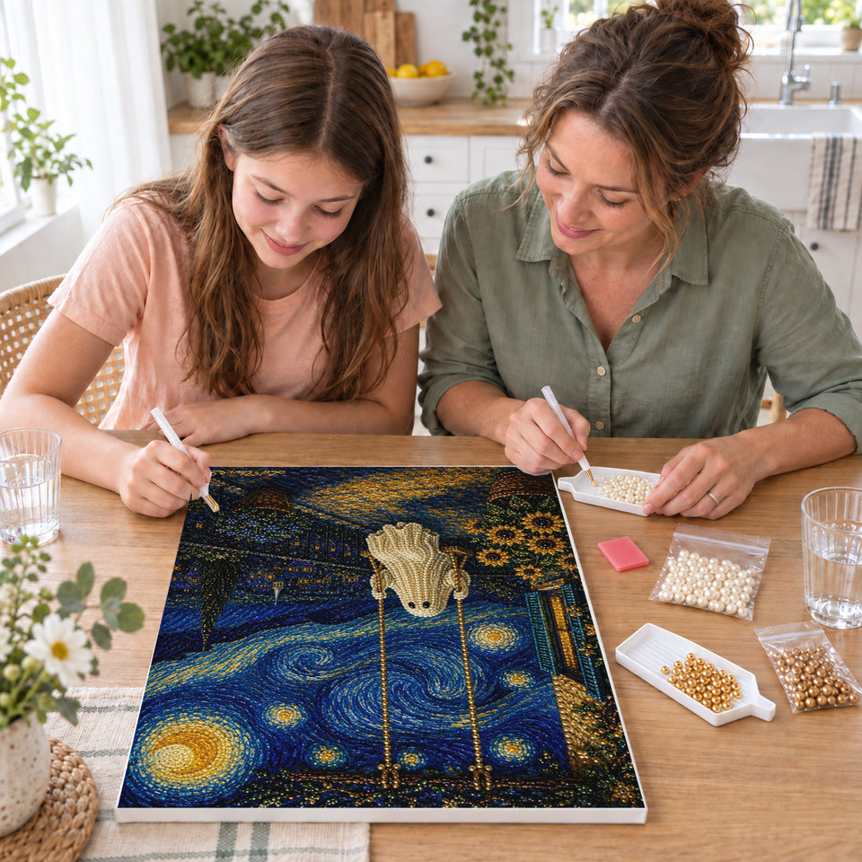 Mother and daughter creating one shared Pearl artwork — Ghost on a Swing Beneath a Swirling Night Sky. Pearl diamond painting DIY kit by Isuvio.