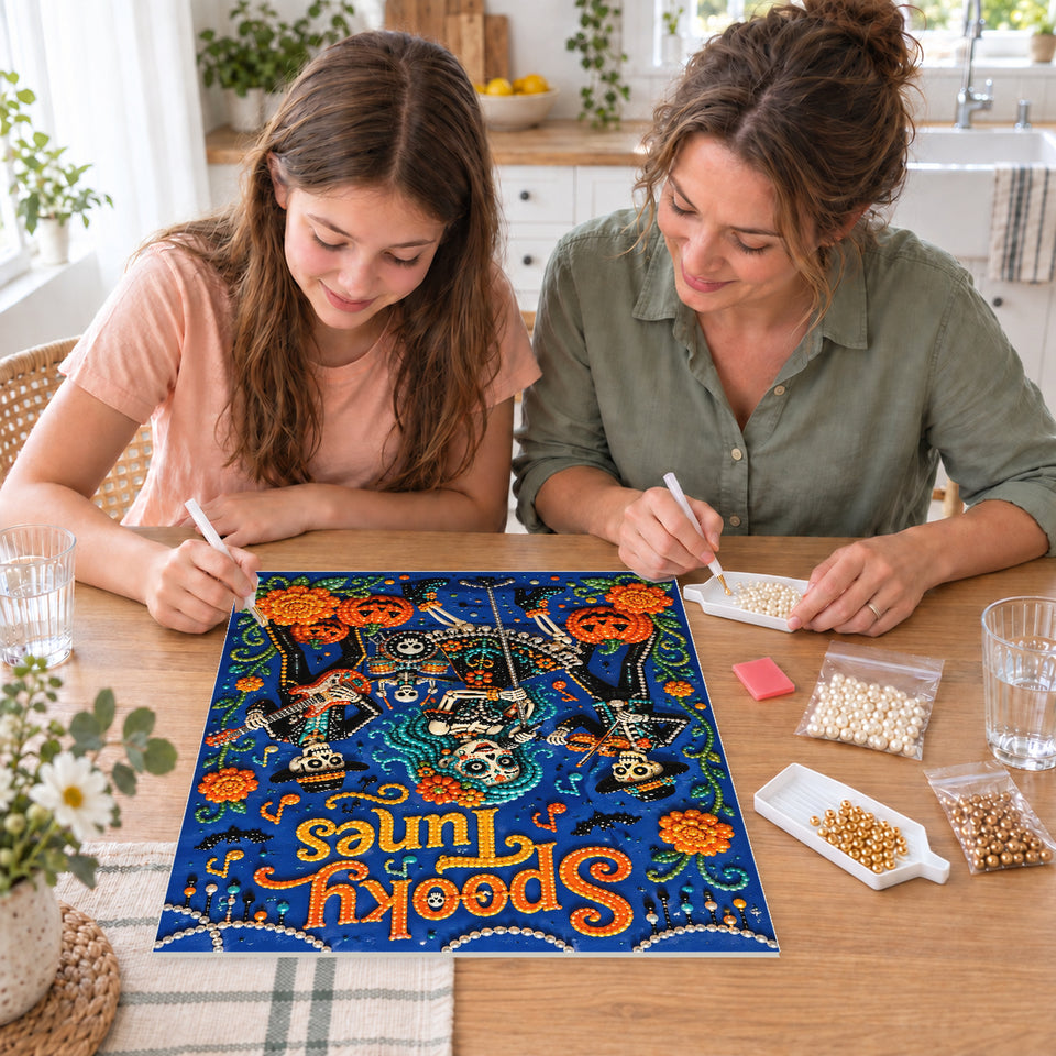 Mother and daughter creating one shared Pearl artwork — Spooky Tunes Skeleton Musicians. Pearl diamond painting DIY kit by Isuvio.
