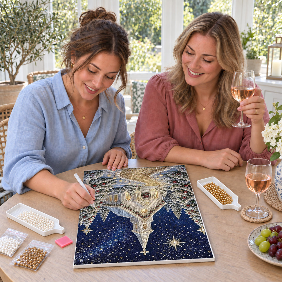 Friends enjoying a sip and craft session — Snowy Christmas Chapel Under the Stars. Pearl diamond painting DIY kit by Isuvio.