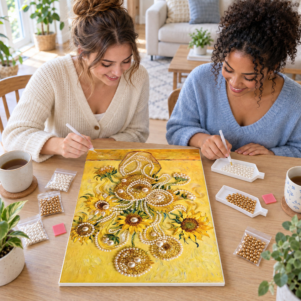 Two friends creating one shared Pearl artwork — Golden Sunflowers in a Pearl-Trimmed Vase. Pearl diamond painting DIY kit by Isuvio.