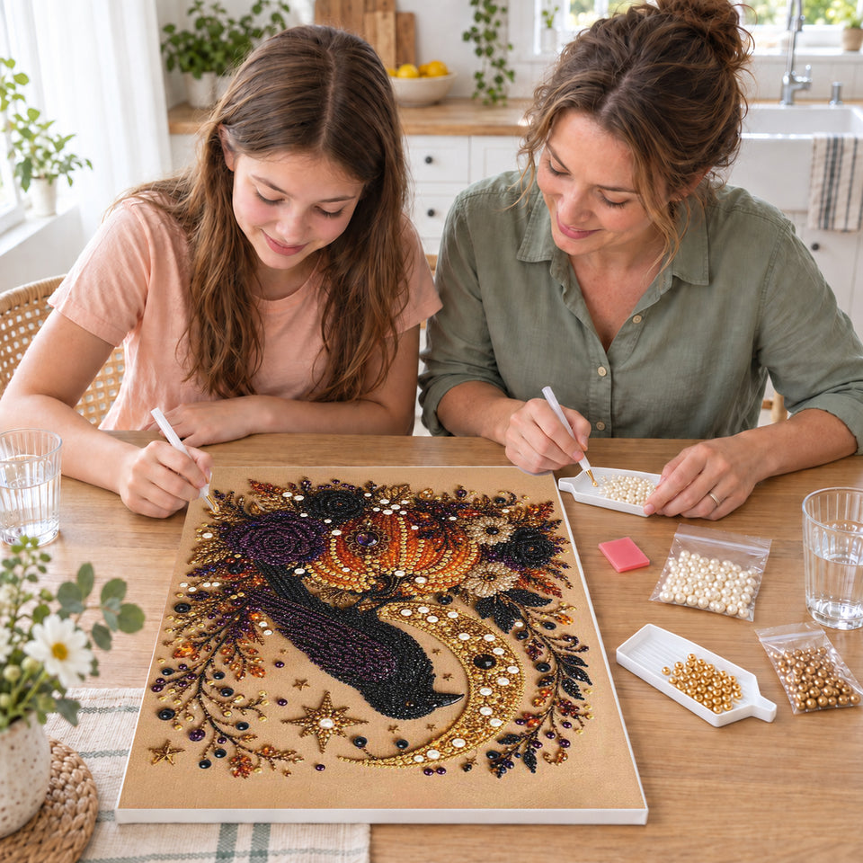 Mother and daughter creating one shared Pearl artwork — Raven Moon and Autumn Pumpkins. Pearl diamond painting DIY kit by Isuvio.