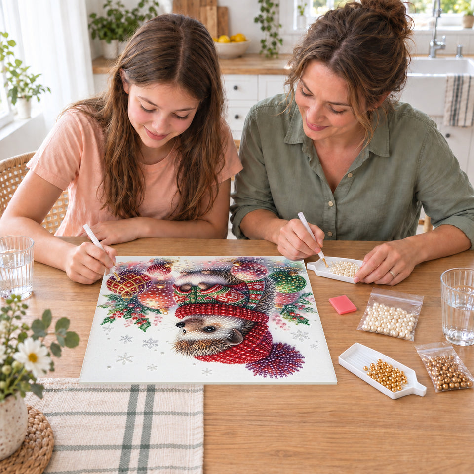 Mother and daughter creating one shared Pearl artwork — Hedgehog in a Christmas Sweater with Ornaments. Pearl diamond painting DIY kit by Isuvio.