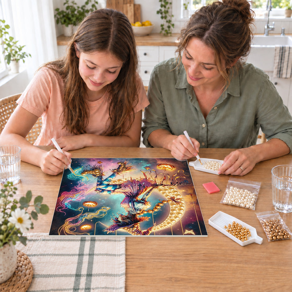 Mother and daughter creating one shared Pearl artwork — Moonlit Witch with Hanging Pumpkins. Pearl diamond painting DIY kit by Isuvio.