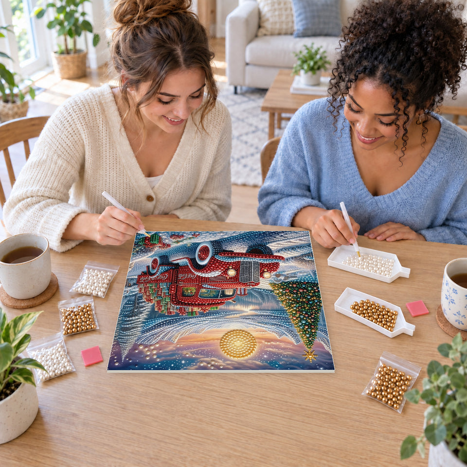 Two friends creating one shared Pearl artwork — Red Christmas Truck beside a Mountain Lake. Pearl diamond painting DIY kit by Isuvio.