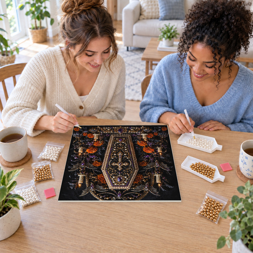 Two friends creating one shared Pearl artwork — Ornate Gothic Coffin Among Candles and Roses. Pearl diamond painting DIY kit by Isuvio.