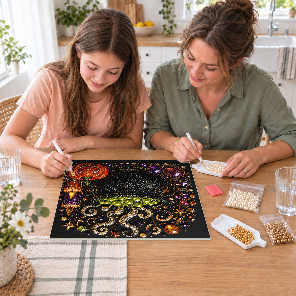 Mother and daughter creating one shared Pearl artwork — Bubbling Green Cauldron with Halloween Candles. Pearl diamond painting DIY kit by Isuvio.