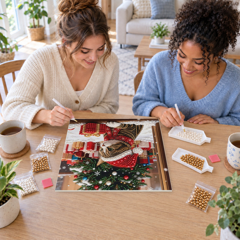 Two friends creating one shared Pearl artwork — Christmas Kitten on a Window Ledge. Pearl diamond painting DIY kit by Isuvio.