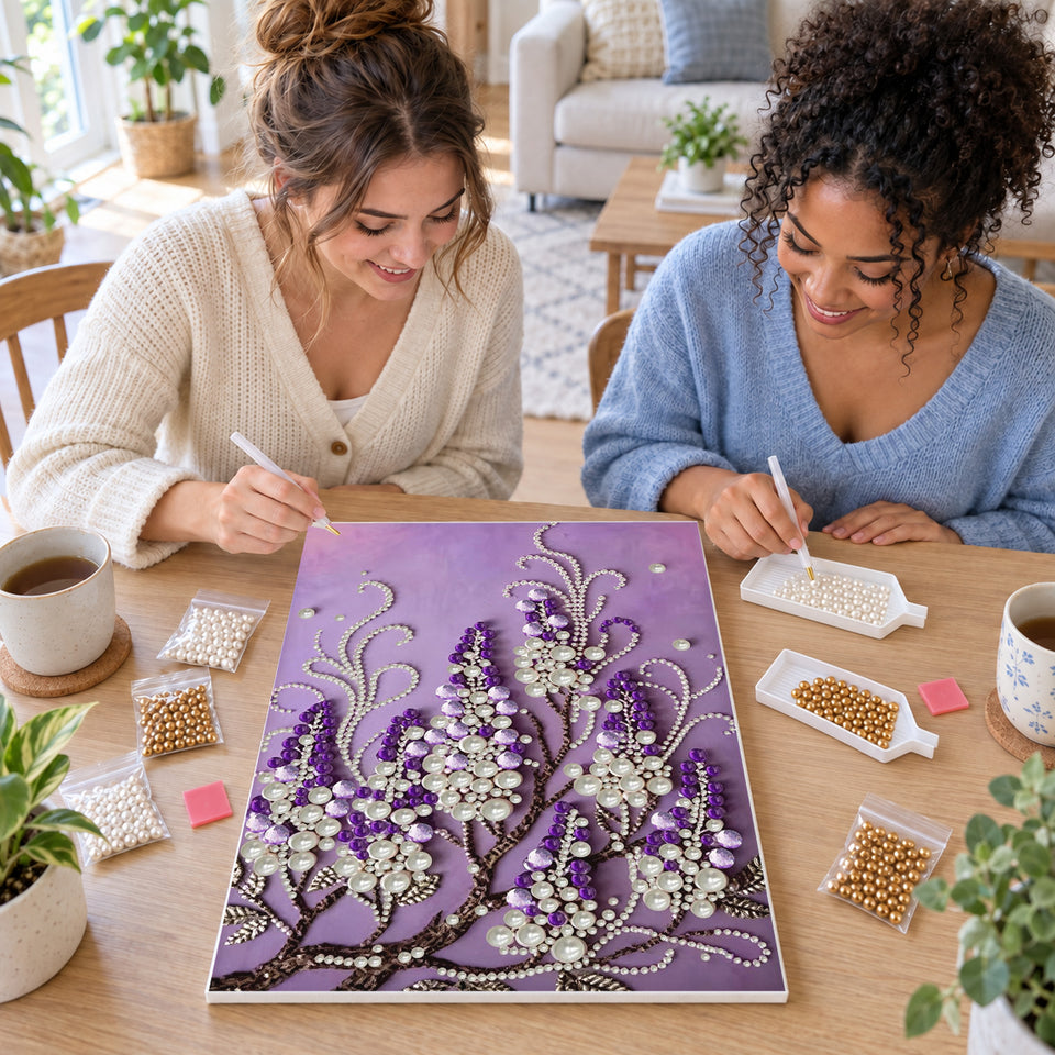 Two friends creating one shared Pearl artwork — Cascading Purple Blossoms and Pearl Strands. Pearl diamond painting DIY kit by Isuvio.