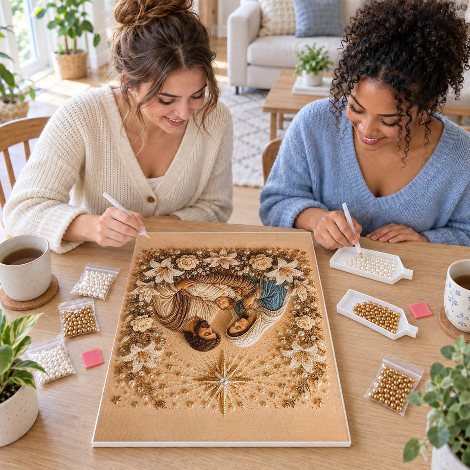 Two friends creating one shared Pearl artwork — Holy Family Beneath a Golden Star. Pearl diamond painting DIY kit by Isuvio.
