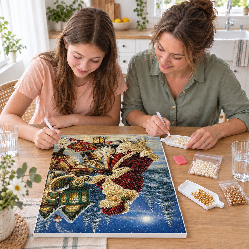 Mother and daughter creating one shared Pearl artwork — Santa with Reindeer and Rabbits by a Snowy House. Pearl diamond painting DIY kit by Isuvio.