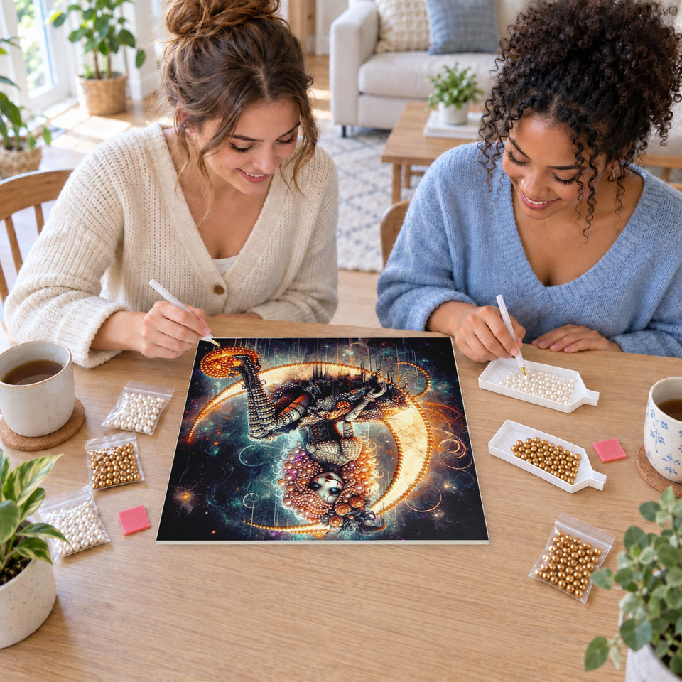Two friends creating one shared Pearl artwork — Gothic Skeleton Doll on a Crescent Moon. Pearl diamond painting DIY kit by Isuvio.