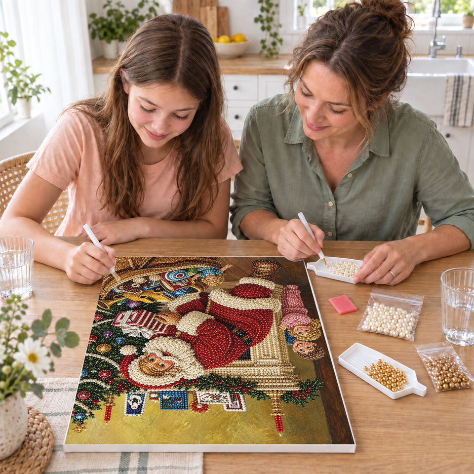 Mother and daughter creating one shared Pearl artwork — Santa Unpacking Toys Beside the Fireplace. Pearl diamond painting DIY kit by Isuvio.