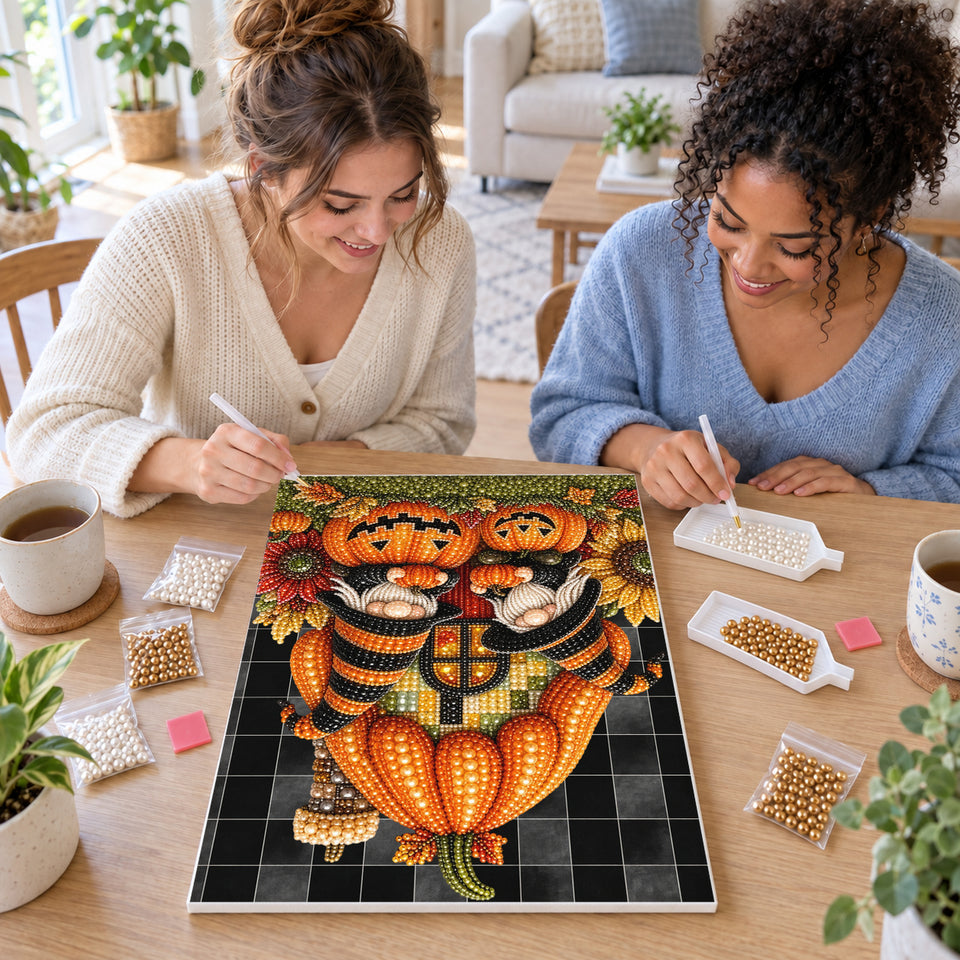 Two friends creating one shared Pearl artwork — Pumpkin House Halloween Gnomes. Pearl diamond painting DIY kit by Isuvio.